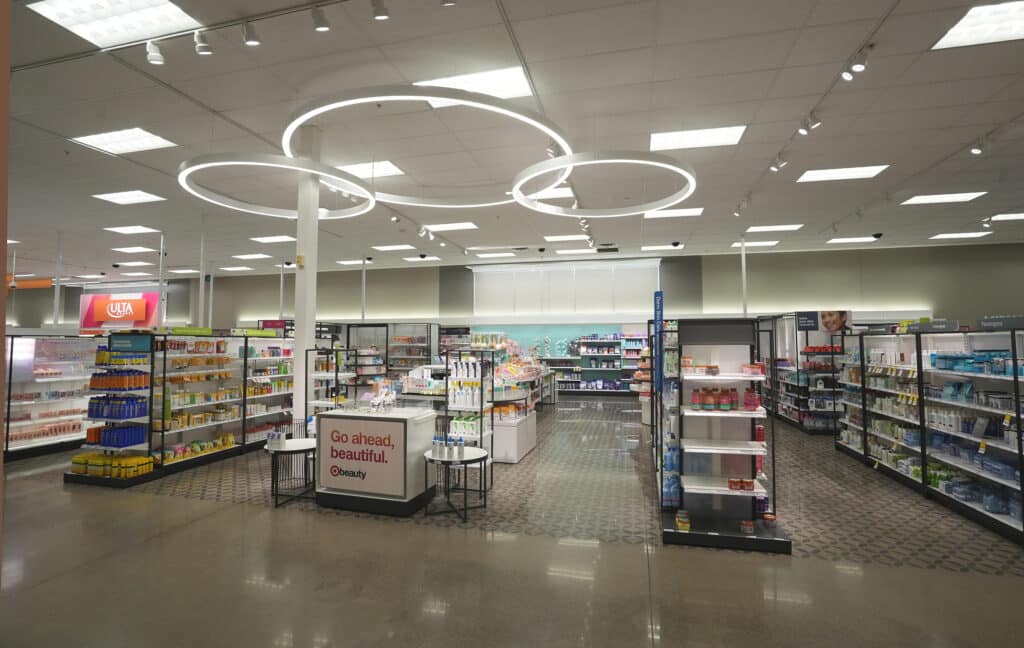The inside of a pharmacy with shelves and shelves of products.